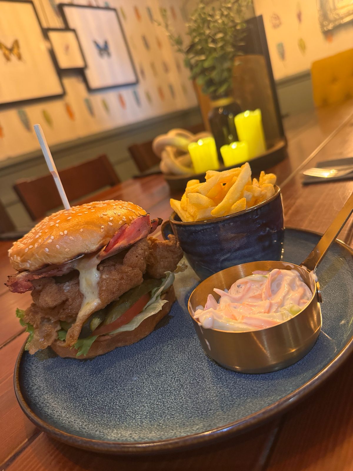 Buttermilk chicken burger with bacon, cheese, chips and slaw